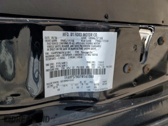 2007 Ford Focus S z VIN 1FAHP37N07W161088, wystawiony jako Copart lot #54140415 z przebiegiem 241 367 mil mil oraz Szkoda całkowita • Salvage title. Historia ofert i sprzedaży dostępna na DreamBid. Obrazek 12.