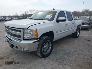 2013 Chevrolet Silverado 1500 LT with VIN 3GCPKSE71DG300433, listed as a IAAI auction lot 41769366 with 210,857 mi miles. Bid and sale history available at carsss.com. Image 2.