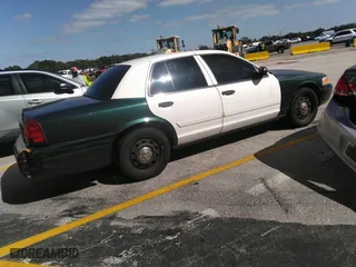 2010 Ford Police Interceptor with VIN 2FABP7BV1AX131372, listed as a IAAI auction lot 41501557 with 131,632 mi miles. Bid and sale history available at carsss.com. Image 4.