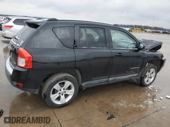 2011 Jeep Compass with VIN 1J4NT1FAXBD138041, listed as a Copart auction lot 87870855 with 184,549 mi miles and Clean Title. Bid and sale history available at carsss.com. Image 3.