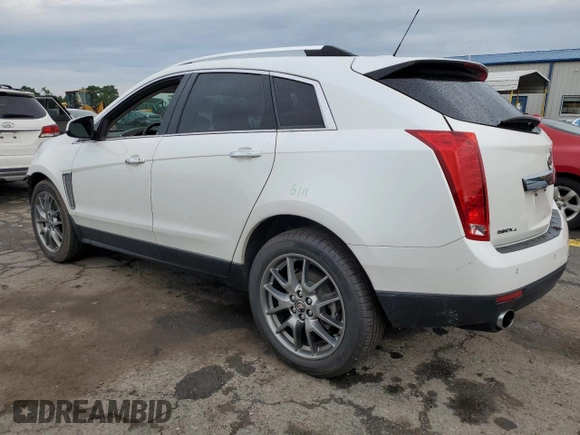 2016 Cadillac SRX Performance Collection with VIN 3GYFNCE31GS580002, listed as a Copart auction lot 62667475 with 135,097 mi miles and Salvage title. Bid and sale history available at DreamBid. Image 2.