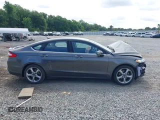 2015 Ford Fusion SE with VIN 3FA6P0H74FR110085, listed as a IAAI auction lot 42371471 with 137,620 mi miles and . Bid and sale history available at DreamBid. Image 14.