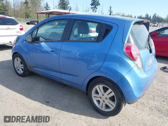 2015 Chevrolet Spark LS with VIN KL8CB6S94FC751401, listed as a IAAI auction lot 42032919 with 61,149 mi miles and . Bid and sale history available at DreamBid. Image 3.