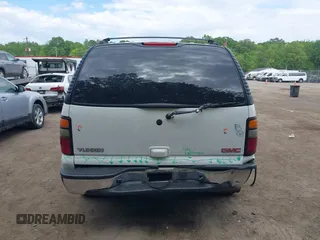 2005 GMC Yukon SLT z VIN 1GKEC13T75R114660, wystawiony jako IAAI lot #42223845 z przebiegiem 199 064 mil mil oraz . Historia ofert i sprzedaży dostępna na DreamBid. Obrazek 16.