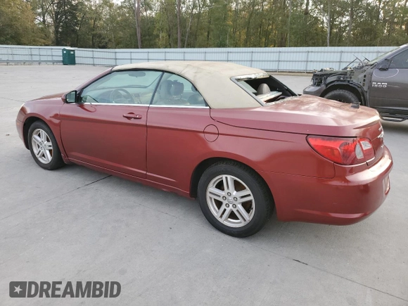 2010 Chrysler Sebring Touring with VIN 1C3BC5ED4AN105044, listed as a Copart auction lot 80578094 with 124,122 mi miles and Salvage Title. Bid and sale history available at carsss.com. Image 2.