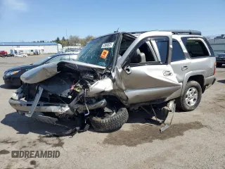 2002 Chevrolet Tahoe Z71 z VIN 1GNEK13Z52R317942, wystawiony jako Copart lot #53800525 z przebiegiem Nie podano mil oraz Szkoda całkowita • Salvage title. Historia ofert i sprzedaży dostępna na DreamBid. Obrazek 1.