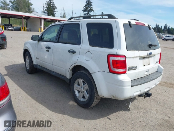 2010 Ford Escape Hybrid with VIN 1FMCU4K35AKC14385, listed as a IAAI auction lot 42182581 with 115,974 mi miles and . Bid and sale history available at DreamBid. Image 3.
