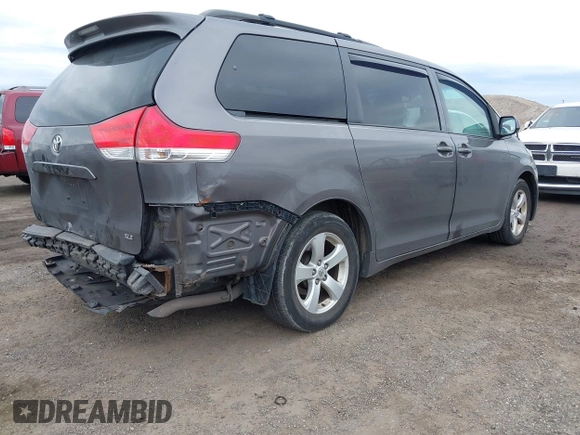 2012 Toyota Sienna XLE AAS with VIN 5TDYK3DC0CS252965, listed as a IAAI auction lot 42059909 with 321,983 mi miles and . Bid and sale history available at carsss.com. Image 4.