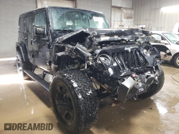 2015 Jeep Wrangler Unlimited Rubicon Hard Rock with VIN 1C4HJWFG4FL676868, listed as a Copart auction lot 48489525 with 100,771 mi miles and Salvage title. Bid and sale history available at DreamBid. Image 4.