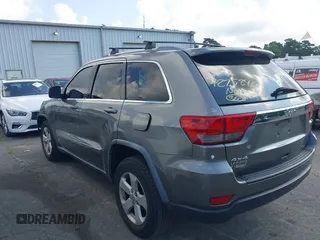 2011 Jeep Grand Cherokee Laredo with VIN 1J4RR4GG7BC736694, listed as a IAAI auction lot 42758461 with 159,875 mi miles and . Bid and sale history available at DreamBid. Image 3.