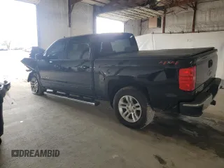 2018 Chevrolet Silverado 1500 LT with VIN 3GCUKREC2JG345482, listed as a Copart auction lot 52452445 with 100,824 mi miles and Salvage Title. Bid and sale history available at DreamBid. Image 2.