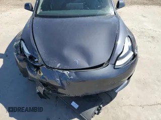 2023 Tesla Model 3 z VIN 5YJ3E1EA0PF407768, wystawiony jako Copart lot #45232555 z przebiegiem 8903 mil mil oraz Nie do naprawy. Historia ofert i sprzedaży dostępna na DreamBid. Obrazek 13.