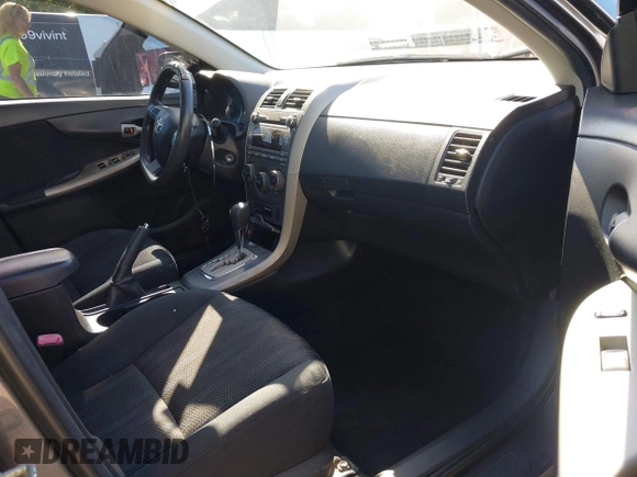 2011 Toyota Corolla L with VIN 2T1BU4EE2BC684289, listed as a IAAI auction lot 42027474 with 214,657 mi miles. Bid and sale history available at carsss.com. Image 5.