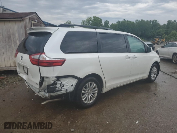 2015 Toyota Sienna XLE with VIN 5TDYK3DC6FS630405, listed as a Copart auction lot 59872045 with 60,306 mi miles and Salvage title. Bid and sale history available at DreamBid. Image 3.