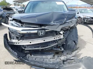 2020 Honda Ridgeline RTL with VIN 5FPYK3F53LB030107, listed as a IAAI auction lot 41933517 with 93,373 mi miles and . Bid and sale history available at DreamBid. Image 6.