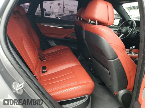 2018 BMW X6 sDrive35i with VIN 5UXKU0C52J0G81057, listed as a Copart auction lot 50698205 with 67,735 mi miles and Salvage Title. Bid and sale history available at carsss.com. Image 12.