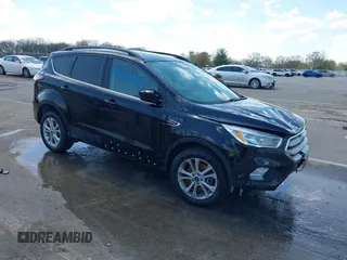 2018 Ford Escape SE z VIN 1FMCU9GD1JUD48846, wystawiony jako IAAI lot #42112952 z przebiegiem 117 580 mil mil oraz . Historia ofert i sprzedaży dostępna na DreamBid. Obrazek 1.