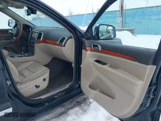 2011 Jeep Grand Cherokee Overland with VIN 1J4RR6GT5BC604784, listed as a IAAI auction lot 41515626 with 66,654 mi miles. Bid and sale history available at carsss.com. Image 5.
