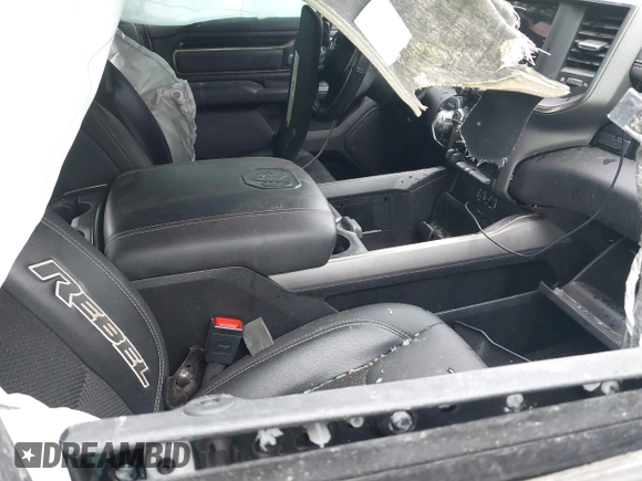 2021 Ram 1500 Rebel with VIN 1C6SRFLT0MN734774, listed as a IAAI auction lot 41075676 with 95,808 mi miles and . Bid and sale history available at DreamBid. Image 5.