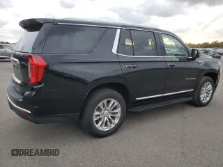 2022 GMC Yukon SLT with VIN 1GKS2BKD0NR290942, listed as a Copart auction lot 82338794 with 26,392 mi miles and Salvage Title. Bid and sale history available at carsss.com. Image 3.