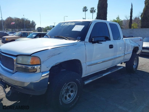 2000 GMC Sierra 1500 SLT with VIN 1GTEC19T7YZ241853, listed as a IAAI auction lot 41657692 with 166,517 mi miles. Bid and sale history available at carsss.com. Image 6.