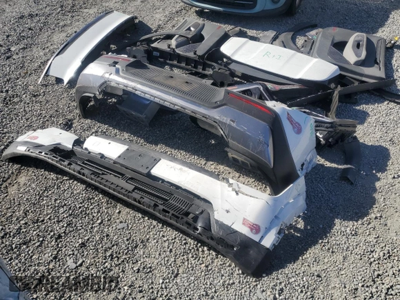 2024 Kia EV9 Wind z VIN KNDAFFS59R6030316, wystawiony jako Copart lot #87417224 z przebiegiem 10 654 mil mil oraz Szkoda całkowita • Salvage title. Historia ofert i sprzedaży dostępna na DreamBid. Obrazek 13.