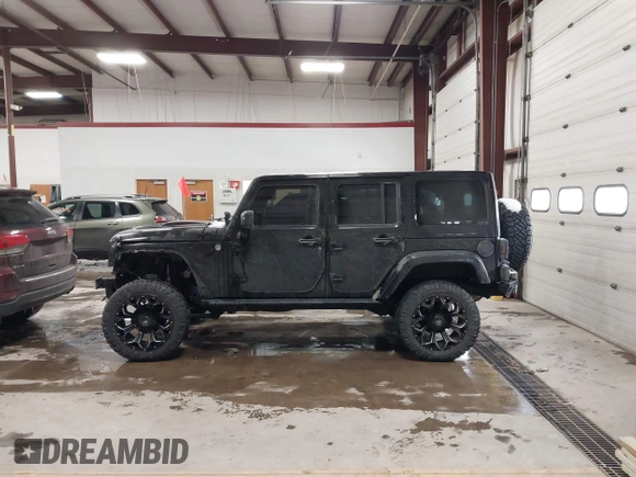 2015 Jeep Wrangler Unlimited Sahara with VIN 1C4BJWEG6FL688382, listed as a IAAI auction lot 41620621 with 138,119 mi miles. Bid and sale history available at carsss.com. Image 15.