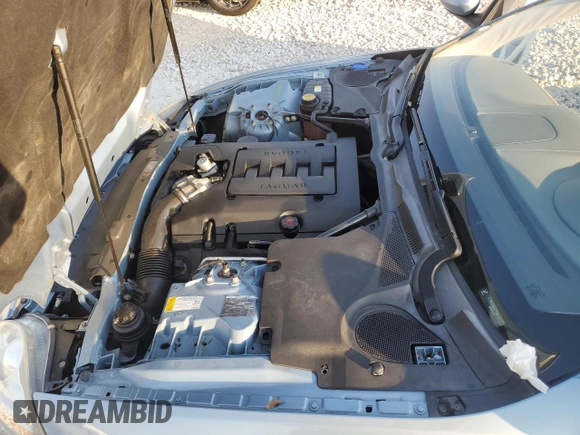 2007 Jaguar XK with VIN SAJWA44BX75B09612, listed as a Copart auction lot 75139114 with 86,094 mi miles and Salvage Title. Bid and sale history available at carsss.com. Image 13.