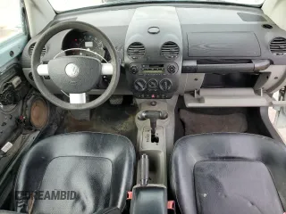 2004 Volkswagen Beetle with VIN 3VWCM21Y64M310431, listed as a Copart auction lot 82449604 with 166,974 mi miles and Salvage Title. Bid and sale history available at DreamBid. Image 8.