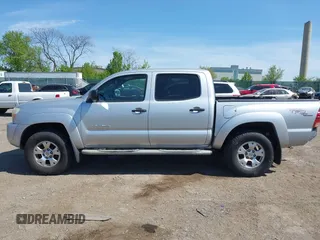 2006 Toyota Tacoma z VIN 5TELU42N66Z147725, wystawiony jako IAAI lot #42097752 z przebiegiem 206 452 mil mil oraz . Historia ofert i sprzedaży dostępna na DreamBid. Obrazek 13.