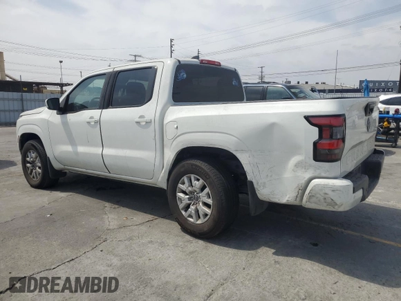 2022 Nissan Frontier SV with VIN 1N6ED1EJ2NN646598, listed as a Copart auction lot 58439325 with 56,882 mi miles and Salvage title. Bid and sale history available at DreamBid. Image 2.