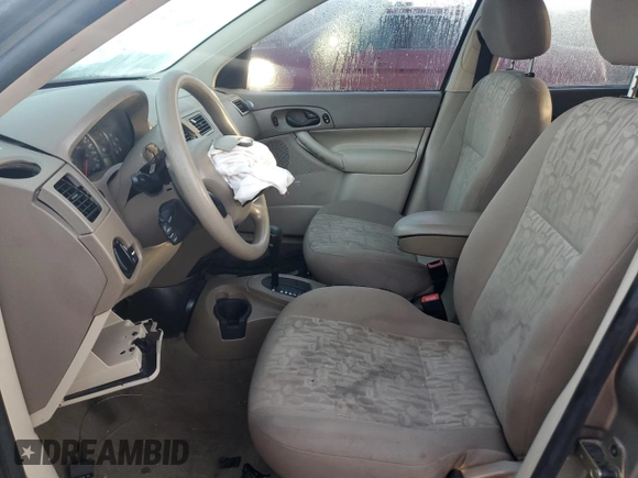 2005 Ford Focus S with VIN 1FAFP34N65W240449, listed as a Copart auction lot 52457395 with 140,246 mi miles and Non Repairable. Bid and sale history available at DreamBid. Image 7.