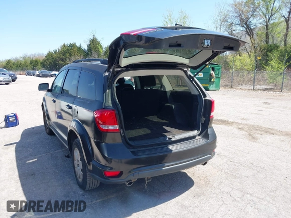 2011 Dodge Journey Mainstreet with VIN 3D4PG1FG0BT527937, listed as a IAAI auction lot 42003997 with 209,894 mi miles and . Bid and sale history available at carsss.com. Image 3.