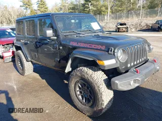 2023 Jeep Wrangler Rubicon with VIN 1C4JJXFGXPW682231, listed as a IAAI auction lot 41110264 with 15,147 mi miles and . Bid and sale history available at DreamBid. Image 1.
