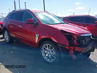 2014 Cadillac SRX Performance Collection with VIN 3GYFNCE34ES519563, listed as a IAAI auction lot 41967051 with 12,603 mi miles. Bid and sale history available at carsss.com. Image 1.