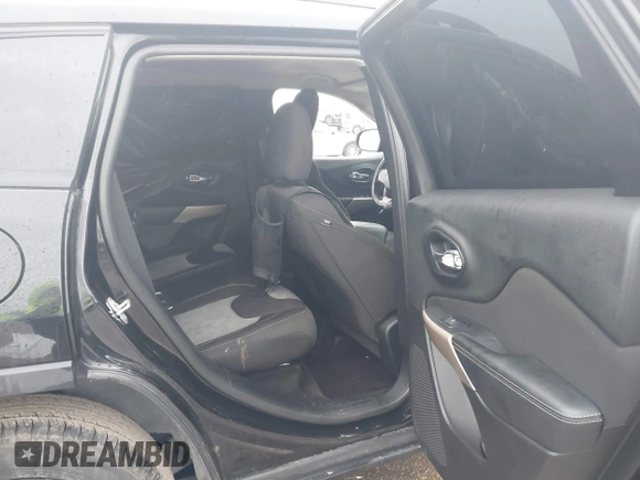 2017 Jeep Cherokee Sport with VIN 1C4PJMAB7HW614572, listed as a IAAI auction lot 41477399 with 117,288 mi miles and . Bid and sale history available at DreamBid. Image 8.