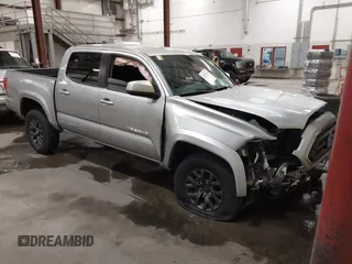 2023 Toyota Tacoma SR with VIN 3TMCZ5AN9PM604793, listed as a IAAI auction lot 42251347 with 39,741 mi miles and . Bid and sale history available at DreamBid. Image 1.