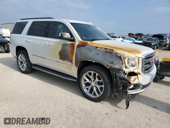 2016 GMC Yukon SLT with VIN 1GKS1BKC2GR248172, listed as a Copart auction lot 53146144 with 125,968 mi miles and Salvage Title. Bid and sale history available at carsss.com. Image 4.