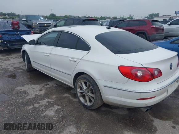 2009 Volkswagen CC Luxury with VIN WVWHL73C39E528446, listed as a IAAI auction lot 42130302 with 231,066 mi miles. Bid and sale history available at carsss.com. Image 3.