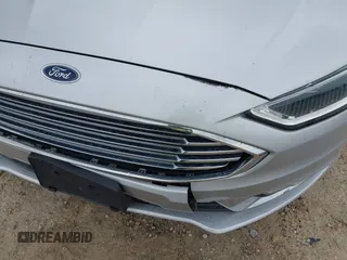 2017 Ford Fusion SE z VIN 3FA6P0HD5HR166433, wystawiony jako IAAI lot #42394998 z przebiegiem 121 333 mil mil oraz . Historia ofert i sprzedaży dostępna na DreamBid. Obrazek 17.