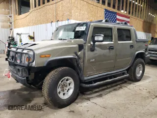 2006 Hummer H2 z VIN 5GRGN22U16H104629, wystawiony jako Copart lot #51204415 z przebiegiem 141 648 mil mil oraz Szkody całkowita. Historia ofert i sprzedaży dostępna na DreamBid. Obrazek 1.