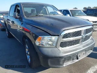 2016 Ram 1500 Tradesman z VIN 1C6RR6KM8GS165137, wystawiony jako IAAI lot #41670364 z przebiegiem 289 202 mil mil oraz . Historia ofert i sprzedaży dostępna na DreamBid. Obrazek 1.