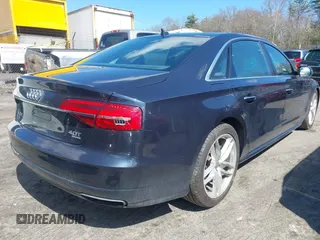 2016 Audi A8 L 4.0T Sport with VIN WAU43AFD1GN022253, listed as a IAAI auction lot 41858053 with 219,517 mi miles. Bid and sale history available at carsss.com. Image 4.