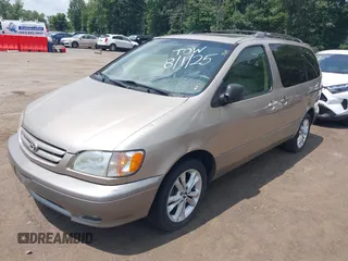 2001 Toyota Sienna LE with VIN 4T3ZF13C01U325889, listed as a IAAI auction lot 42795570 with 211,585 mi miles and . Bid and sale history available at DreamBid. Image 2.