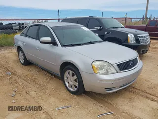 2005 Ford Five Hundred SE z VIN 1FAFP23195G149114, wystawiony jako IAAI lot #42228184 z przebiegiem 160 380 mil mil oraz . Historia ofert i sprzedaży dostępna na DreamBid. Obrazek 1.