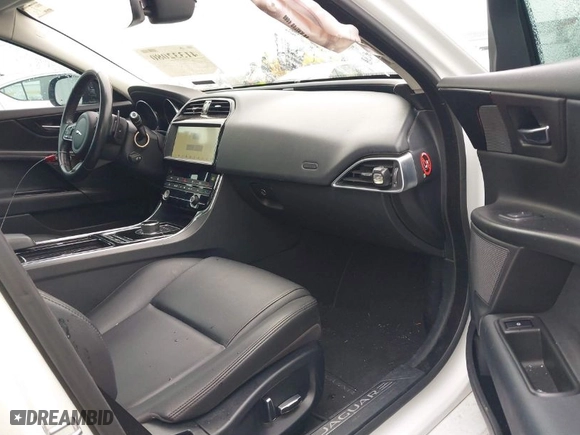 2019 Jaguar XE 25t with VIN SAJAR4FX0KCP52659, listed as a IAAI auction lot 41332080 with 96,936 mi miles. Bid and sale history available at carsss.com. Image 5.