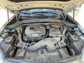 2017 BMW X1 sDrive28i with VIN WBXHU7C39H5H34971, listed as a Copart auction lot 51869265 with 108,051 mi miles and Clean Title. Bid and sale history available at carsss.com. Image 7.