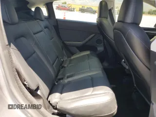 2024 Tesla Model Y Long Range with VIN 7SAYGDEE0RA288420, listed as a Copart auction lot 59159015 with 7,831 mi miles and Salvage title. Bid and sale history available at DreamBid. Image 10.