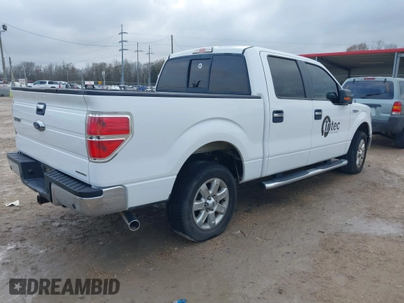 2014 Ford F-150 XL with VIN 1FTFW1CF9EKD01702, listed as a IAAI auction lot 41447899 with 185,247 mi miles. Bid and sale history available at carsss.com. Image 4.