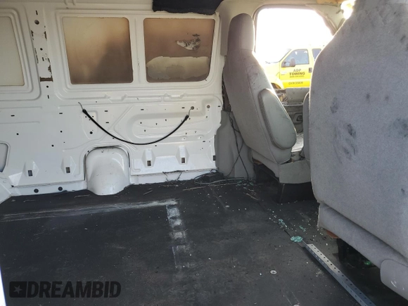 2013 Ford Econoline Cargo Commercial with VIN 1FTNE1EW6DDA13974, listed as a Copart auction lot 85720354 with 167,406 mi miles and Salvage title. Bid and sale history available at DreamBid. Image 11.